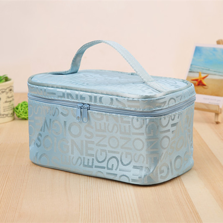 Nueva bolsa de maquillaje de letras de mujer de moda cuatro cuadros de viaje bolsa de almacenamiento portátil fábrica directa