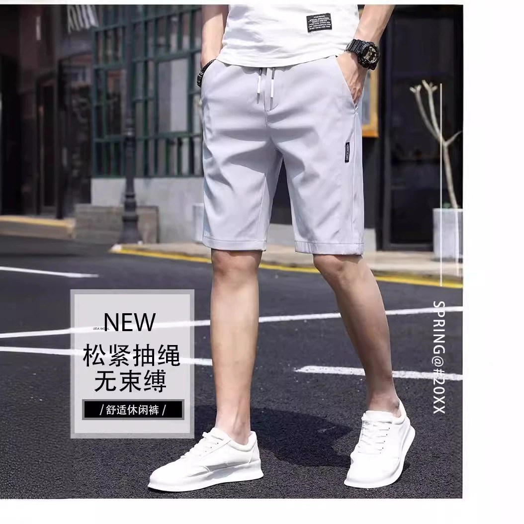 2024 повседневные шорты для мужчин летом новая корейская версия свободная эластичная шитая маркировка пляжные пятикратные брюки