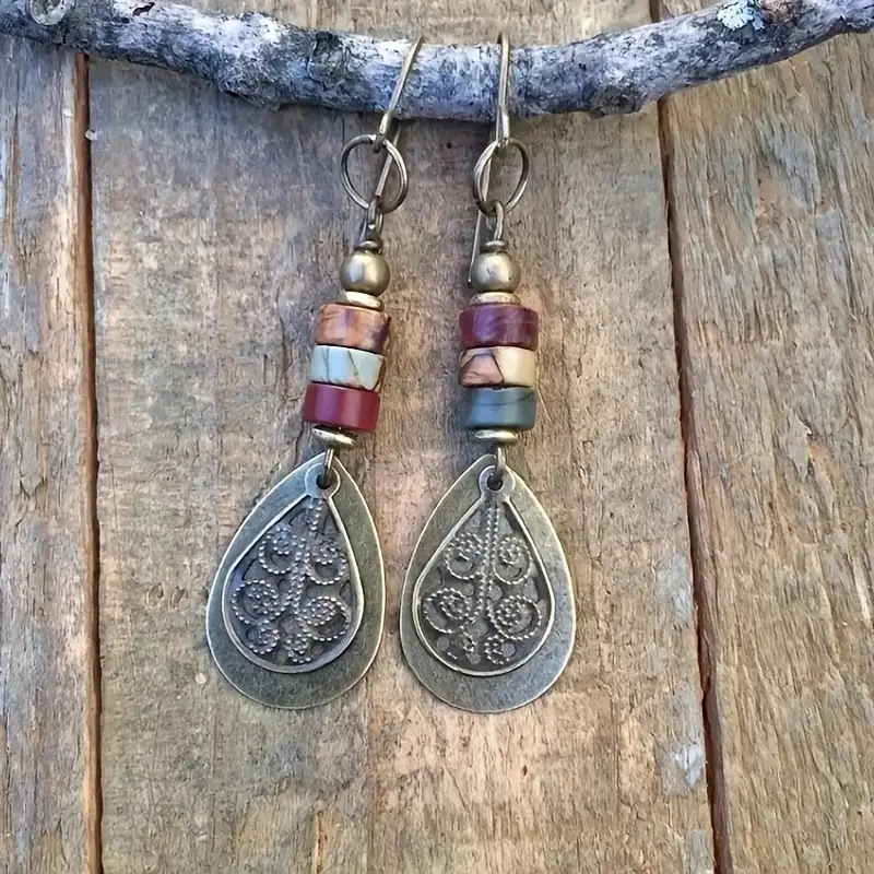 Jasmine cross-border wish Europe and the United States best selling bronze carved earrings women's creative drop pendant earrings jewelry wholesale