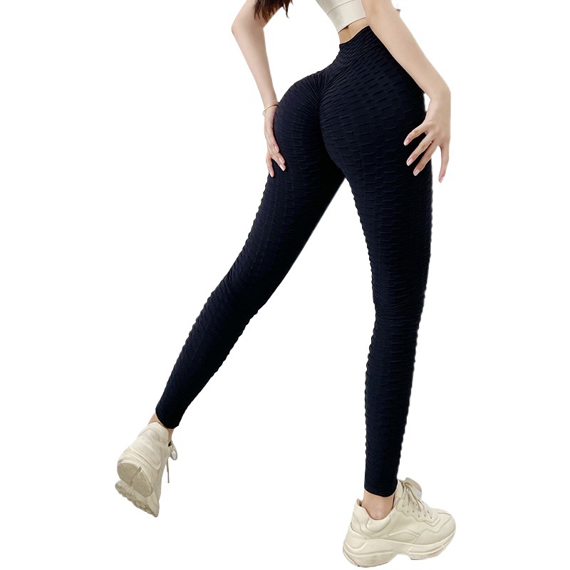 Pantalones de yoga jacquard sin costuras estilo europeo y americano, pantalones deportivos de secado rápido que realzan los glúteos, pantalones para realzar el trasero.