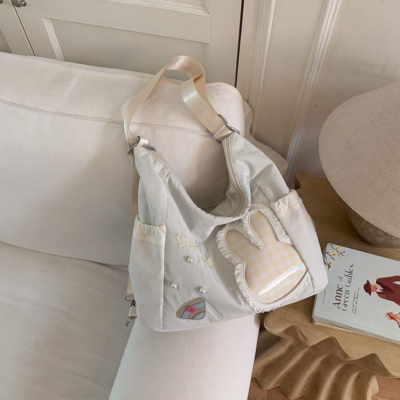 Bolsa multipropósito de dibujos animados coreanos para mujeres verano 2026 nueva moda dulce mochila de hombro de viaje bolsa de ocio image 9