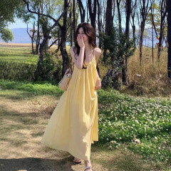 海辺の休暇内張りストラップ黄色ワンピース女性夏の新型ゆるい超仙ファッション気質カジュアルロングスカート
