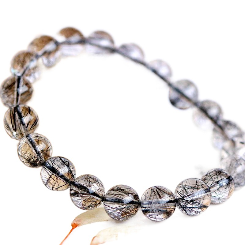 El pelo negro natural de la pulsera cristalina al por mayor del pelo negro de la pulsera cristalina del pelo bueno menos pelo 5A más 3A dos clases de cristal negro del pelo