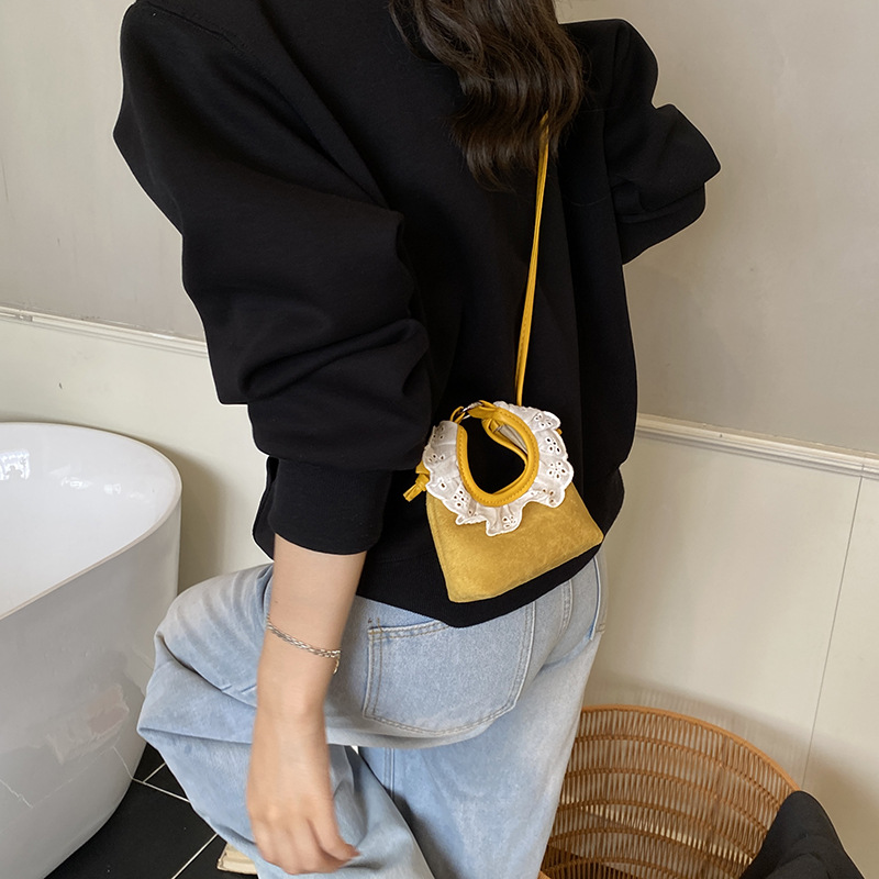 Bolsa de mano de encaje coreano para niñas, mini lindos bebés mochila simple de color sólido para niños.