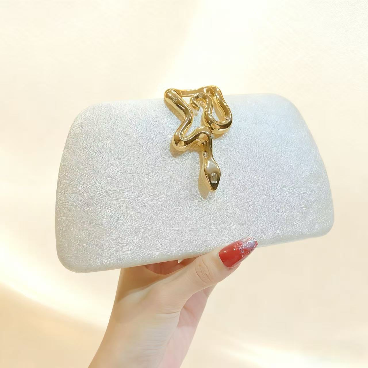 Transfronterizos damas lujosas cadenas bolsas de cena de cerradura de serpiente bolsas de noche de boda de alto nivel bolsas de mano