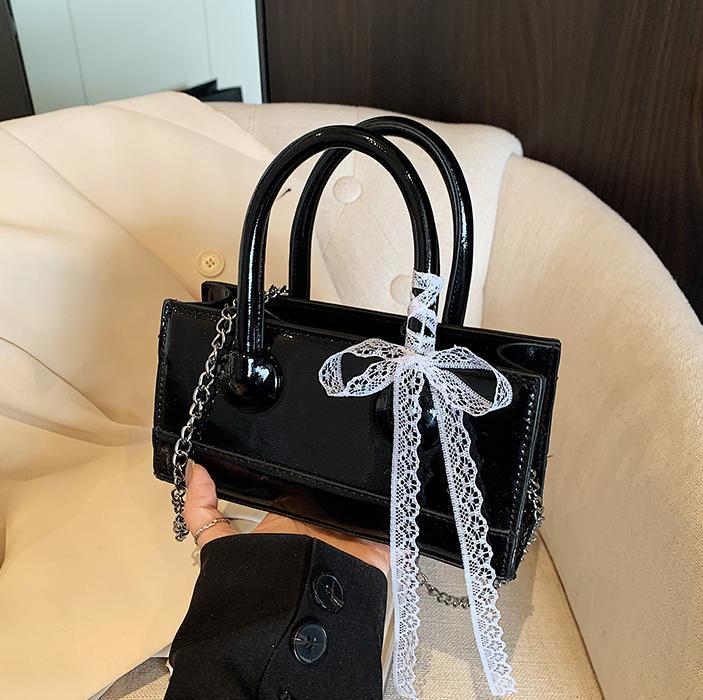 2025 verano venta caliente nuevo bolso cuadrado pequeño portátil moda todo fósforo bolso de mensajero de un solo hombro diseño de nicho bolso femenino de moda