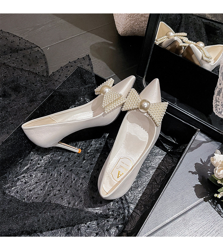 Scarpe da sposa bianche con fiocco eleganti tacchi donna_voghion.com