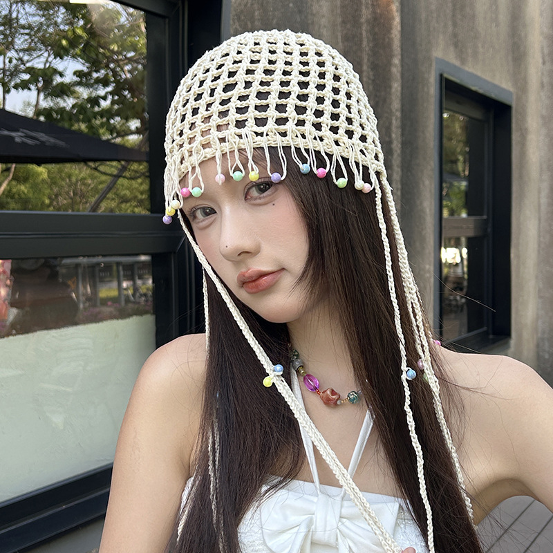 女性用の春夏の手織り中空つば帽子、エスニックスタイルのフックフラワー、タッセルストラップ、プルオーバーニット帽、多用途|undefined
