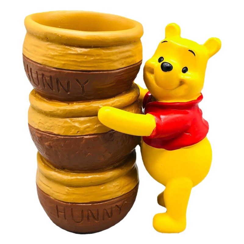 Winnie the Pooh gafas titular de teléfono móvil titular de la pluma de almacenamiento de tres ojos monstruo teléfono móvil titular resina Decoración