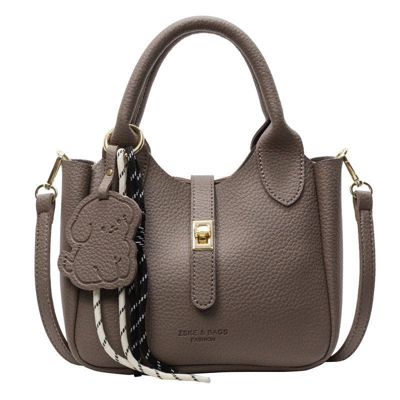 Nicho coreano bolso de cesta de verduras de mano mujer 2025 comercio exterior nueva moda bolso de cubo de moda bolso de hombro universal