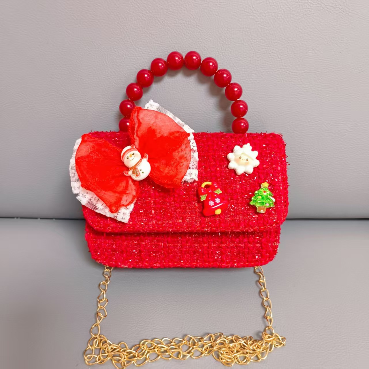 Cartera de Año Nuevo rojo arco de papá Noel bolso de perla pequeña cadena de viento fragante bolso de hombro