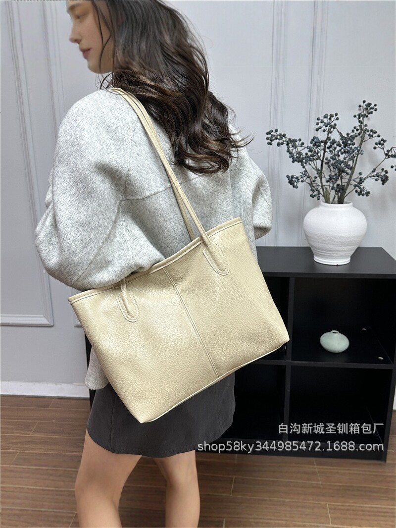 2026 nueva bolsa de gran capacidad de moda de mujer alta textura bolsa de hombro de viaje simple bolsa de mano universal image 3