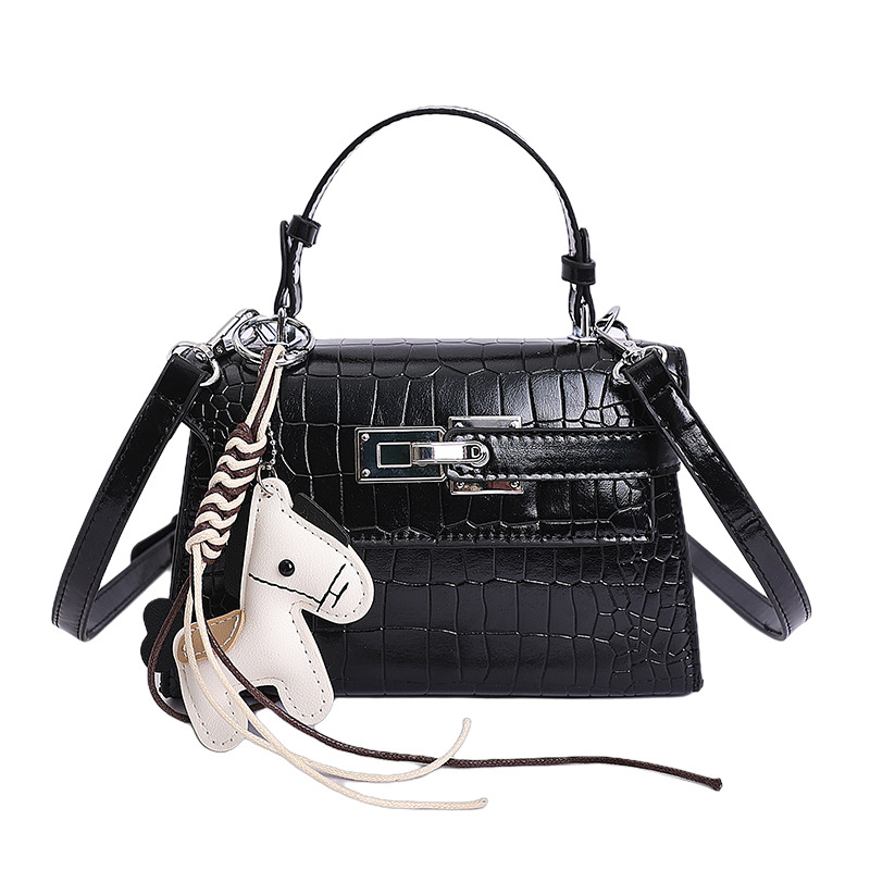Bolsos de textura de nicho de cocodrilo de alta calidad, bolsos de mujer 2026 nuevos bolsos de mochila, bolsos de bloqueo de moda