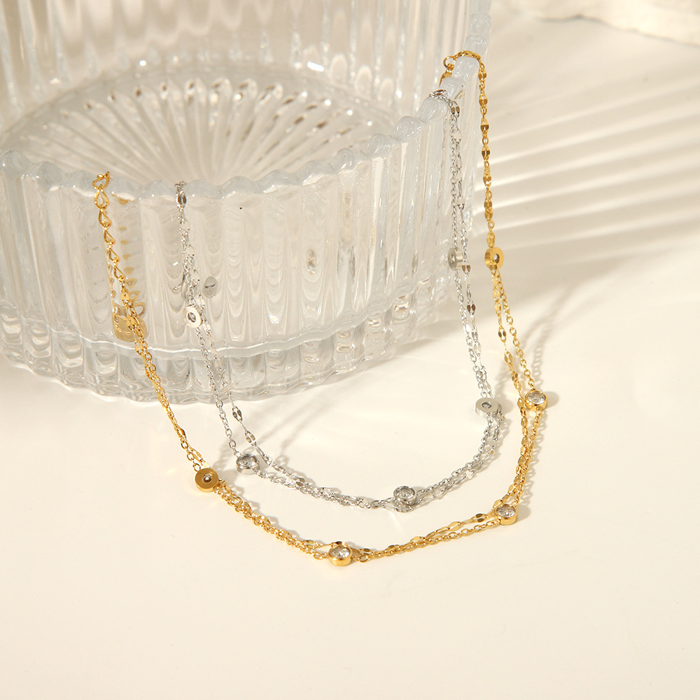 INS estilo europeo y americano simple acero inoxidable 18K doble capa viento frío sentido de alta calidad circón cadena de pie mujer verano tobillera