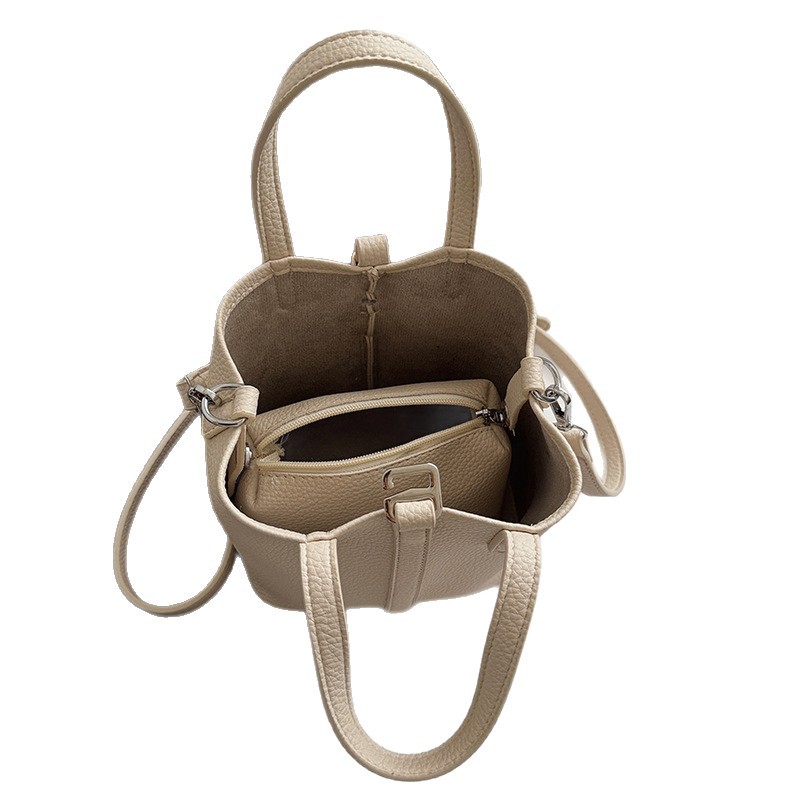 Nicho transfronterizo bolsas de cestas de verduras bolsas de cubo de mano otoño / invierno 2025 nuevo bolso de mujer moda retro mochila de hombro