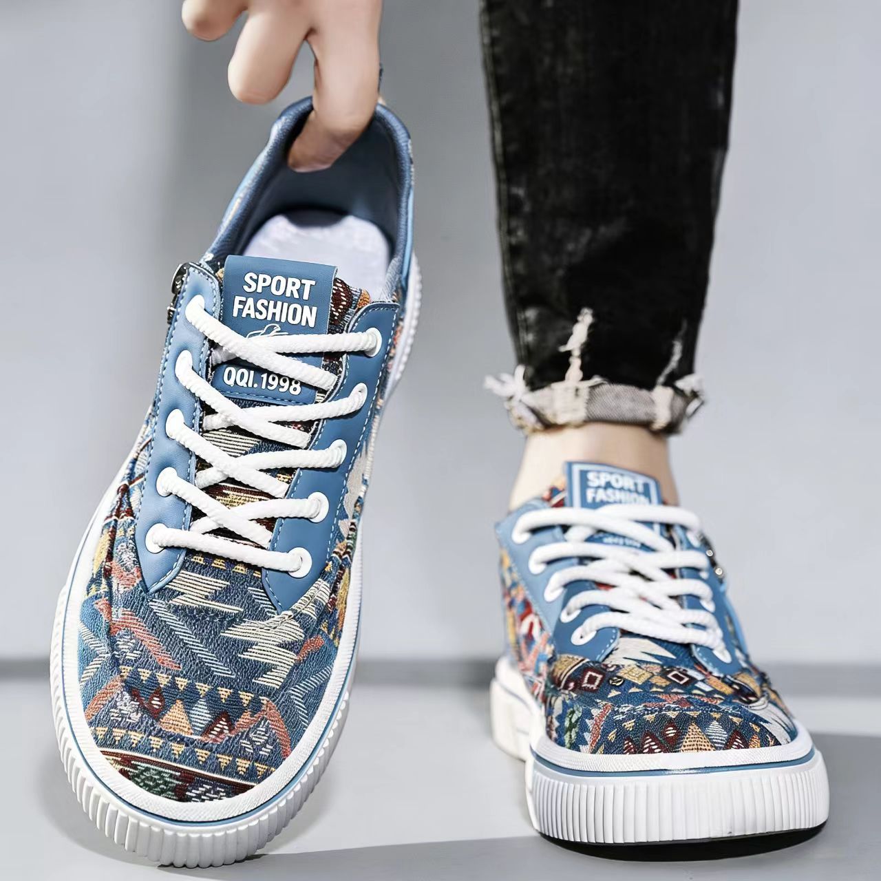 Zapatos de lienzo impresos para hombres primavera transpirable con nicho de diseño casual zapatos de skate para hombres ligeros con suela suave casual