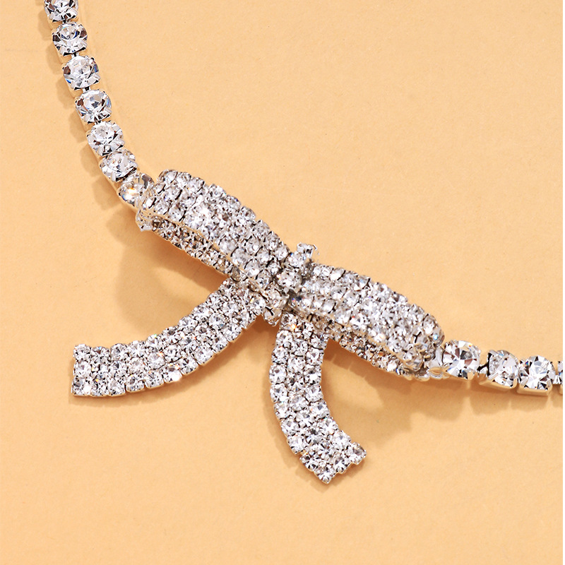 Nuevo conjunto de joyería de arco transfronterizo, collar de diamante, pernos redondos, accesorios simples, conjunto de joyería femenina