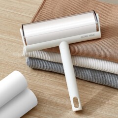粘着ローラーの引き裂き式の粘着紙のローラーブラシは毛を吸います。