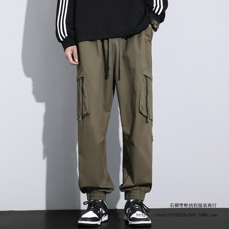 Nuevos pantalones de trabajo de alta calidad de primavera para hombres, moda multibolsillos con tendencia universal