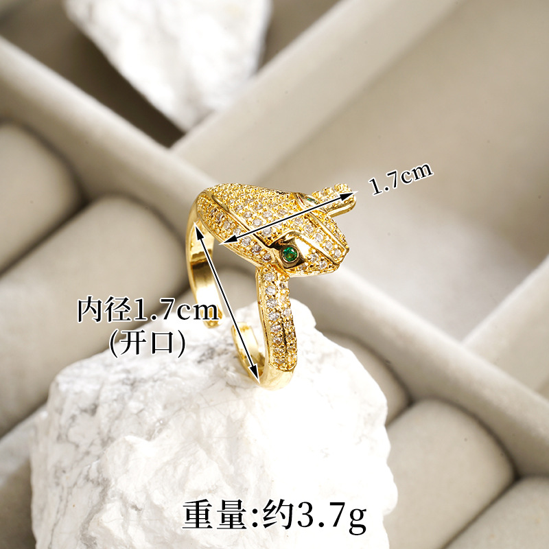 Brazalete de oro galvanizado de arena transfronteriza de 18k esmalte de color universal cabeza de serpiente de micro-pantalón anillo de piedra abierto joyas de estilo europeo y americano