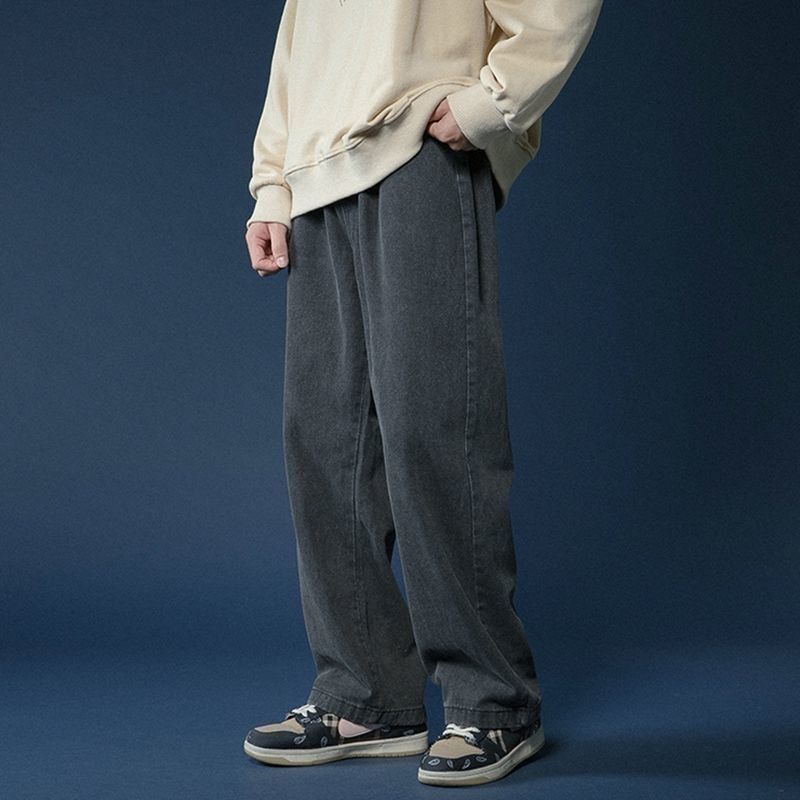 Hong Kong estilo retro pantalones vaqueros de color claro de los hombres sueltos todo partido casual de moda de pierna ancha Pantalones rectos de los hombres de la calle