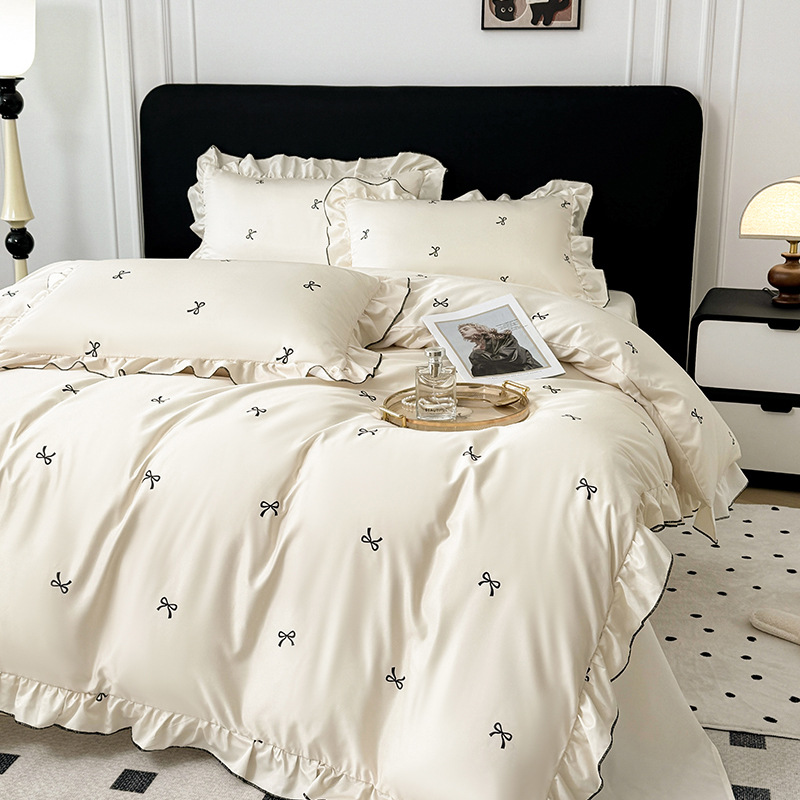 Primavera y verano lujoso helado de cuatro piezas de lavado con agua de tres piezas de sábanas lavadoras a máquina seda lisa y desnuda para dormir cubierta de edredón doble