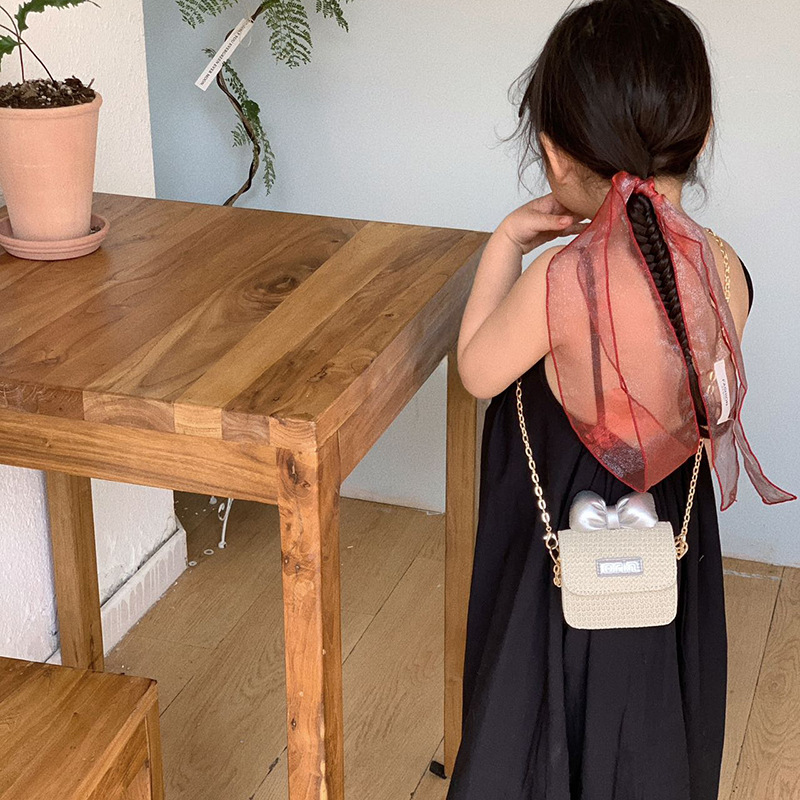 Bolso de hombro para niños y niñas de estilo coreano mini bolso de mensajero para niños con lazo lindo 2025 nuevo bolso de paja para niños