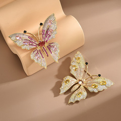 Elegant, niche, and luxe petite zircon butterfly brooch—high-end, fashion-forward clothing accessory designed to prevent wardrobe malfunctions, available wholesale.
