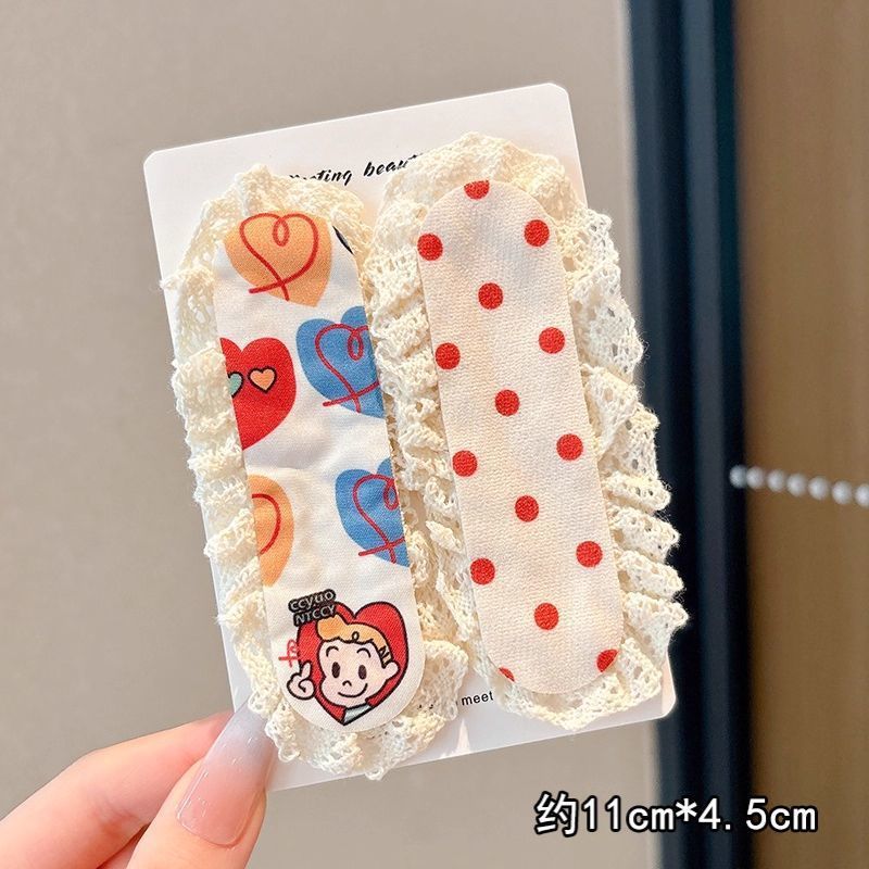 2#Set polkadot merah (sepotong panjangnya sekitar 11cm dan lebar 4,5cm)