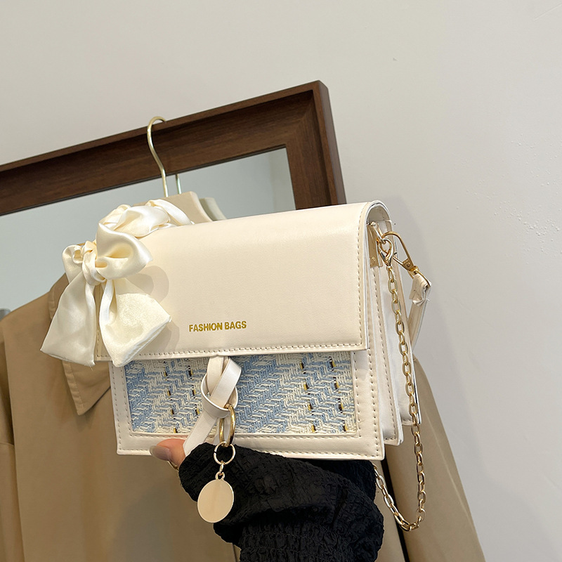 Bolsos de alta calidad para mujeres verano 2024 nueva moda cadena de moda brazo pequeño bolso cuadrado universal mochila de hombro