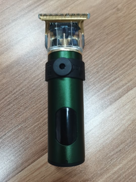 Corte de pelo eléctrico transfronterizo al por mayor retrógrado tallado impulsor eléctrico cabeza baldía de aceite impulsor eléctrico cortadora de plástico afeitar