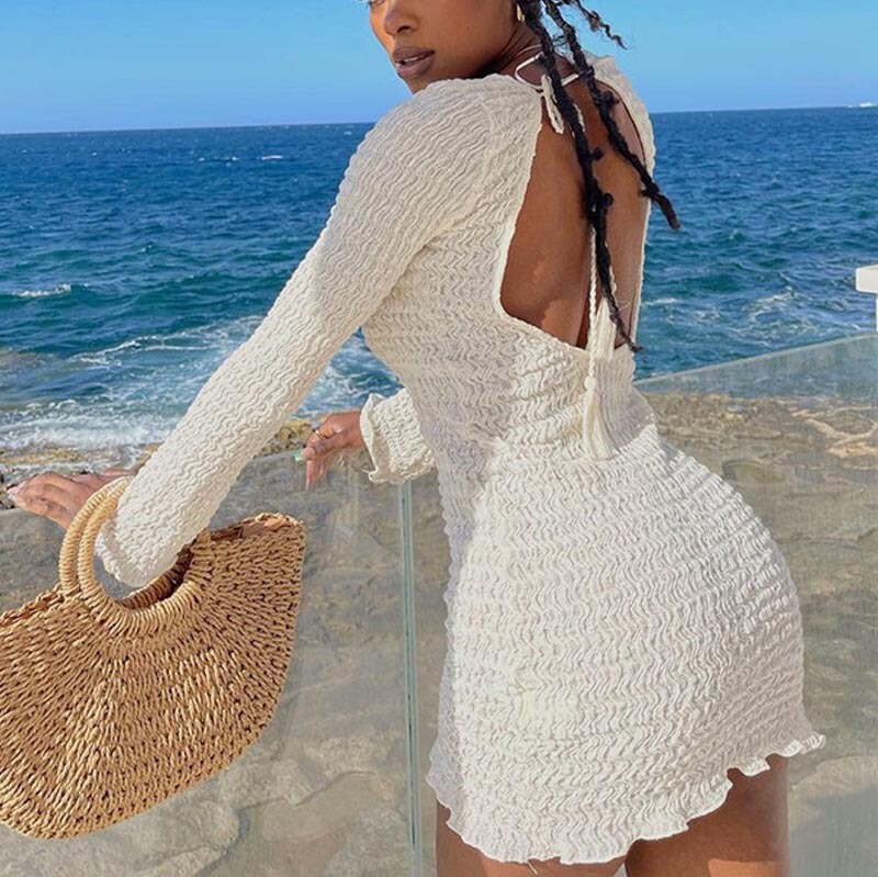 European and American women's autumn holiday style new bubble thread solid color round neck lace-up large backless dress skirt wholesale