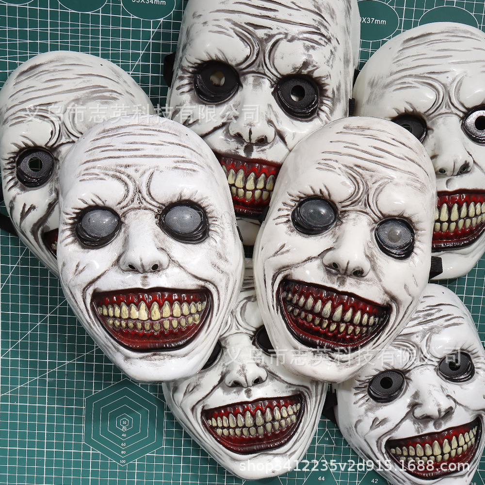 2022 estación independiente Venta caliente exorcista máscara brillante ojos blancos sonrisa máscara Halloween máscara de terror