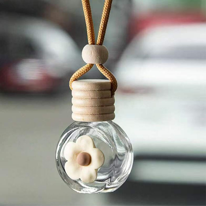 Espejo retrovisor de coche de dibujos animados botella de perfume colgante de coche botella vacía flor creativa botella de aromaterapia de coche aceite esencial decoración de coche