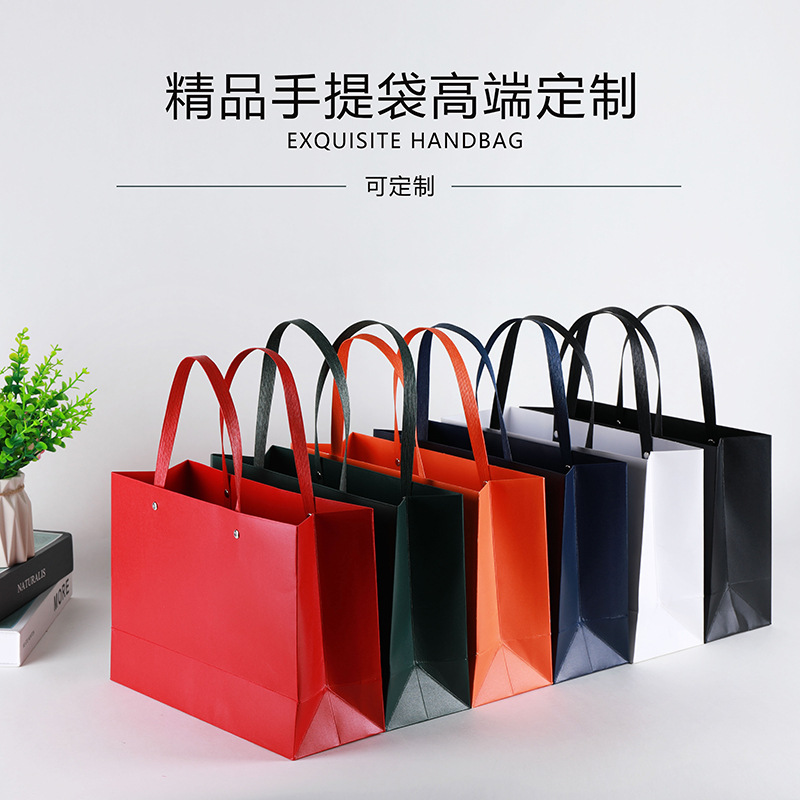 大号礼品袋高档服装牛皮纸手提袋横版竖款婚庆礼物袋铆钉纸袋批发