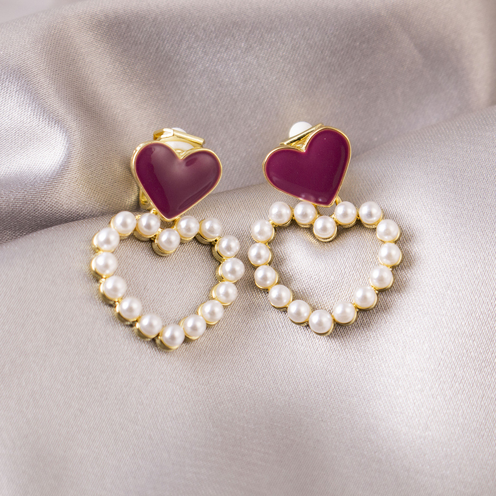 Perlas de amor huecas sin orejas nuevas pinzas para la oreja que gotean aceite corazón melocotón dulce pinzas para la oreja de triángulo avanzado pendientes elegantes mujeres