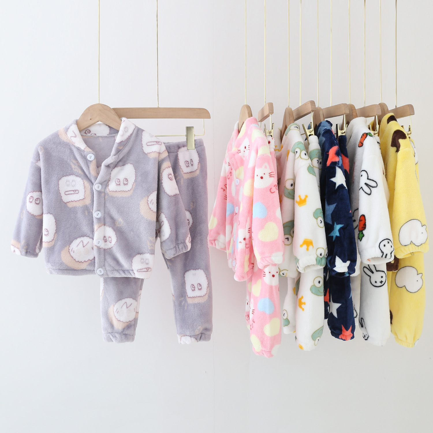 2021 Otoño e Invierno traje de pijama para niños franela niños y niñas estampado flor hebilla cardigan hogar conjunto de dos piezas primavera