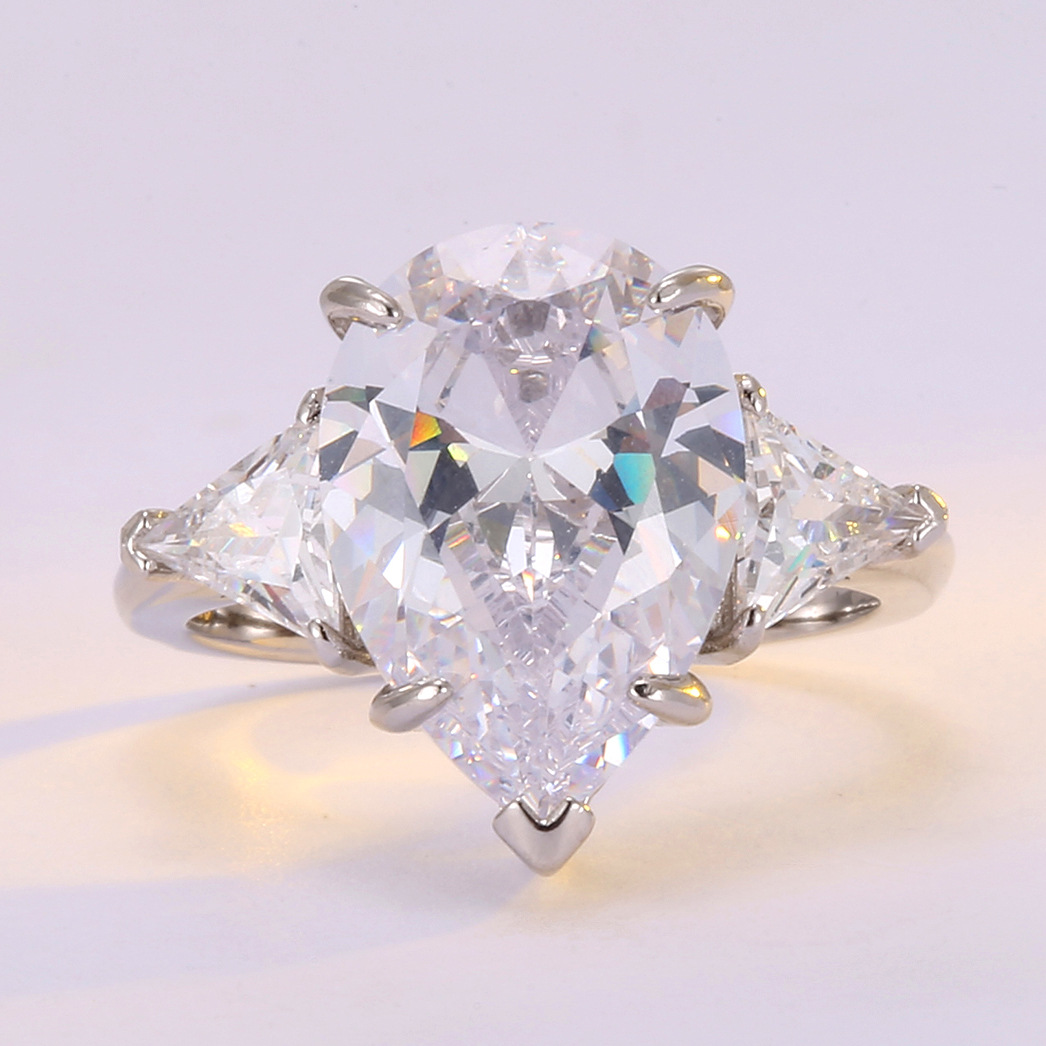 Cross-border exaggerated 10*15 water drop pear-shaped engagement ring female net red water drop diamond ring European and American triangle zircon ring