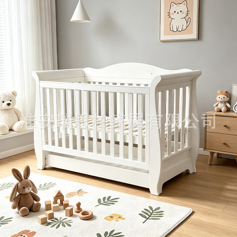 Solid wood baby crib, European-style newborn baby splicing bed with drawers and adjustable guardrail height, in stock at the factory