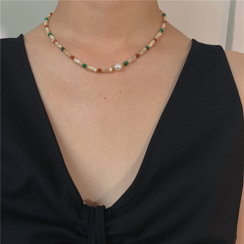 Titanium steel milk tea color freshwater pearl necklace with colored beads, abalone lockchain, layered for a stylish and trendy look.