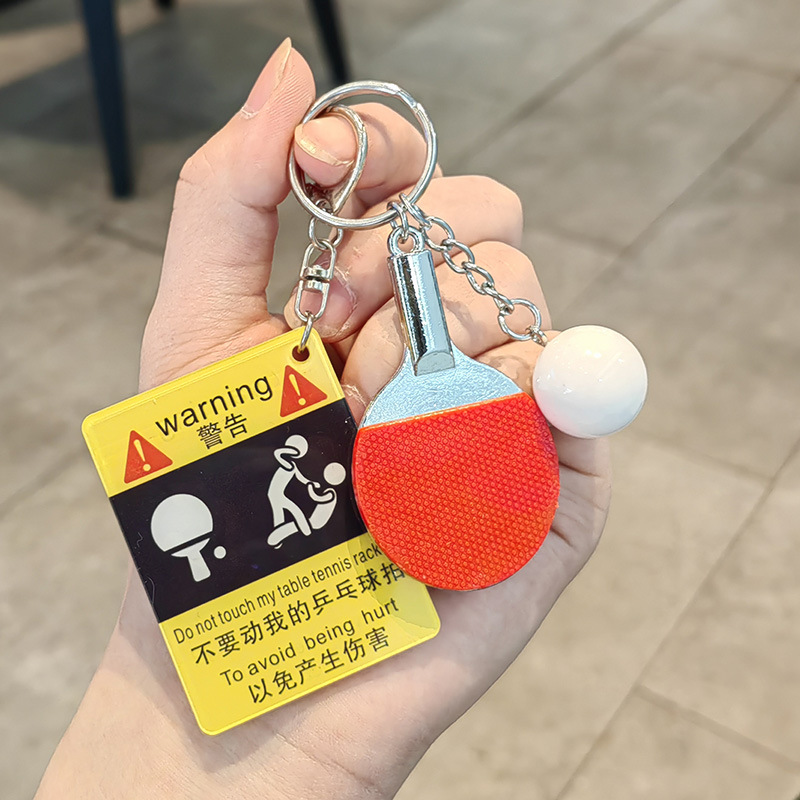 Beating ping pong warning sign + big ping pong ball