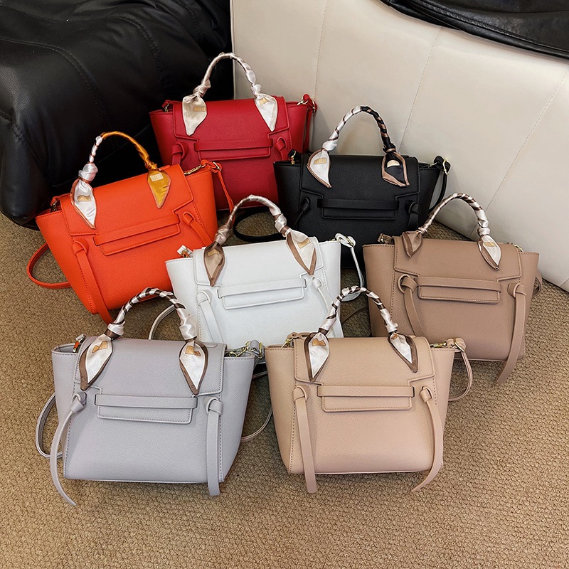 Texturas de moda transfronterizas bolsas de alas portátiles mujeres 2024 primavera nuevo nicho de diseño extranjero bolsas de hombro