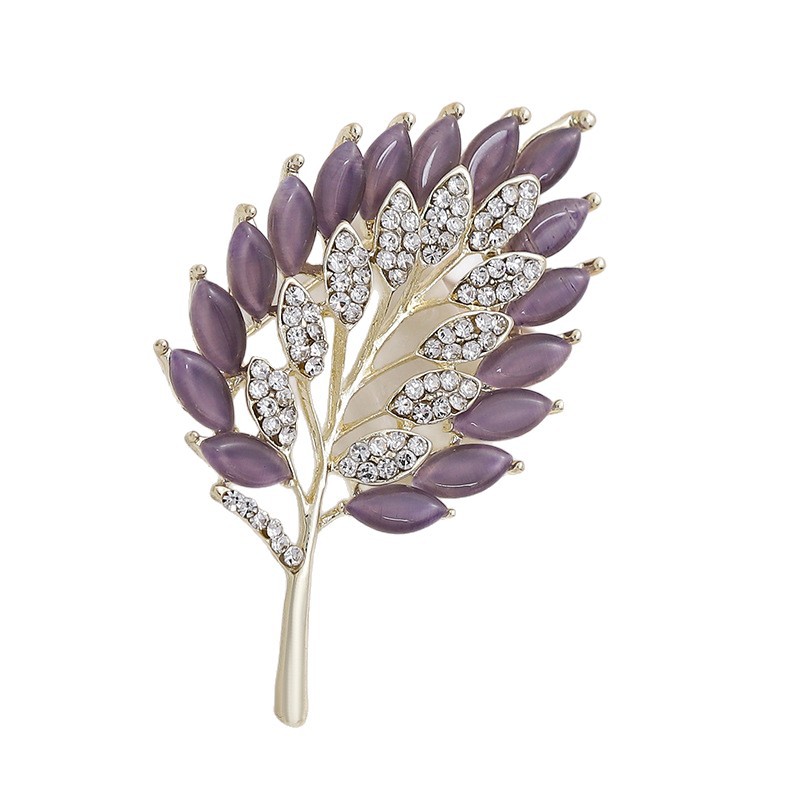 Klaverblad broche met kattenoogsteen voor dames elegante speld_voghion.com