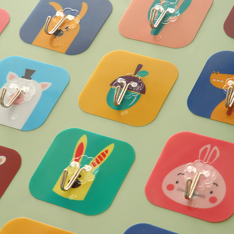 Gancho de dibujos animados fuerte pegajoso sin clavos sin costuras para colgar en la pared gancho de ropa cocina impermeable gancho pegajoso fábrica al por mayor