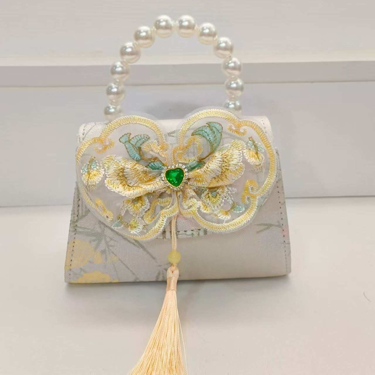 Bolsos de perlas de arco de estilo nacional, bolsos de cadena de princesa, bolsos de ropa antigua, accesorios para niños, bolsos de regalos para niñas