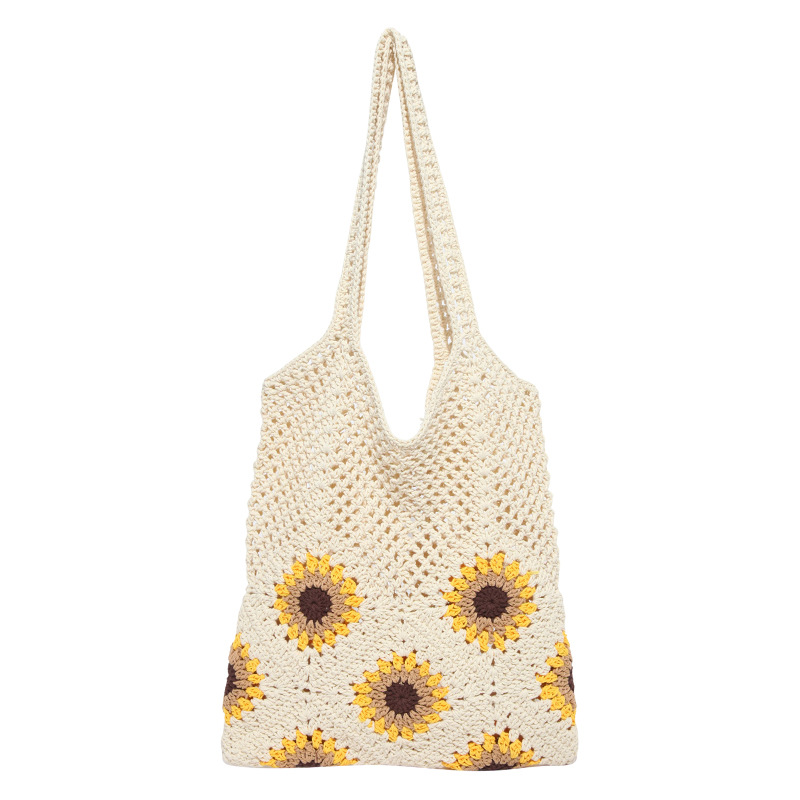 Versión coreana del bolso de nicho 2025 verano nuevo bolso femenino flor tejido bolso de hombro hueco de gran capacidad