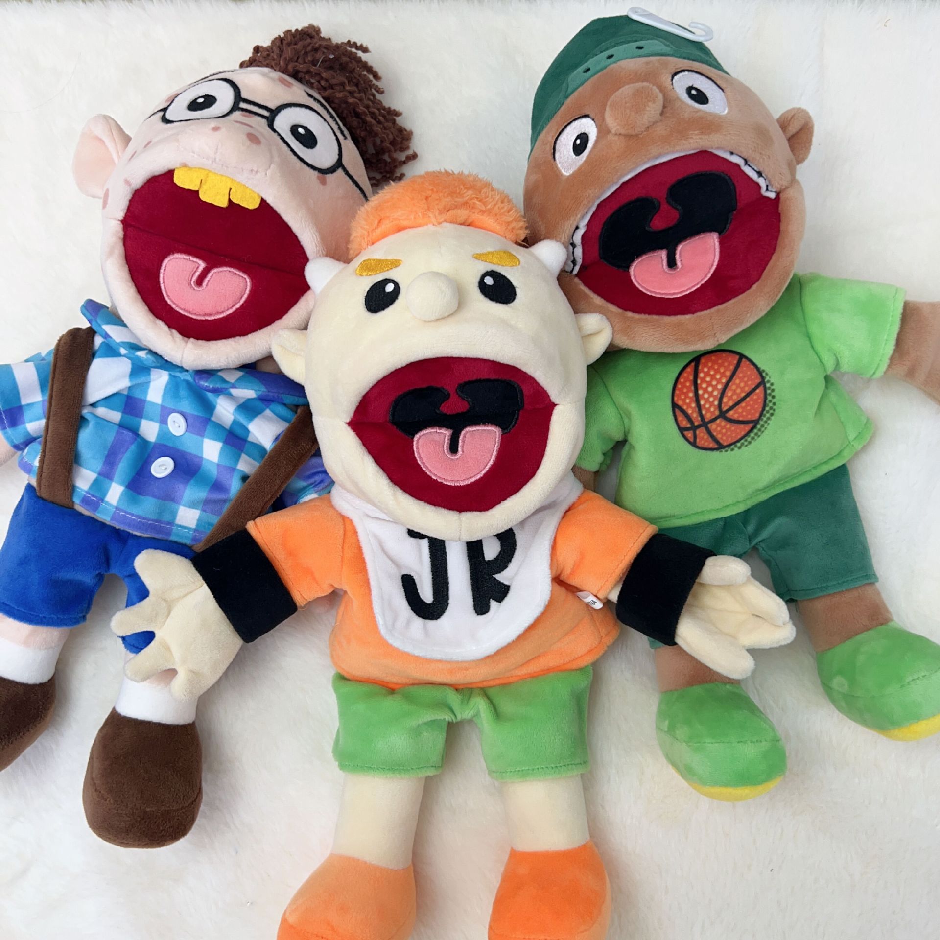 Marionetas de mano transfronterizas Jeff spot al por mayor divertido niño boca móvil juguete de peluche Junnier muñeca de trapo abstracta