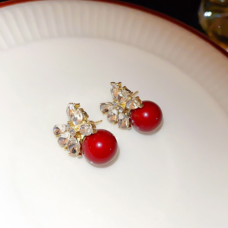 Aguja de plata Pendientes de lazo de diamantes coreanos Pendientes de temperamento de moda de todo fósforo Pendientes de diseño de nicho Sentido de lujo ligero