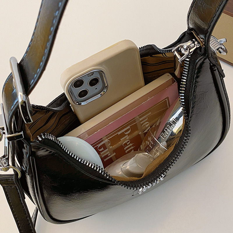 Bolsos de mujer al por mayor, nueva tendencia, bolsos de hombro de moda de alta gama, color sólido, dulce y fresco, bolso de bola de masa de mensajero con estampado brillante