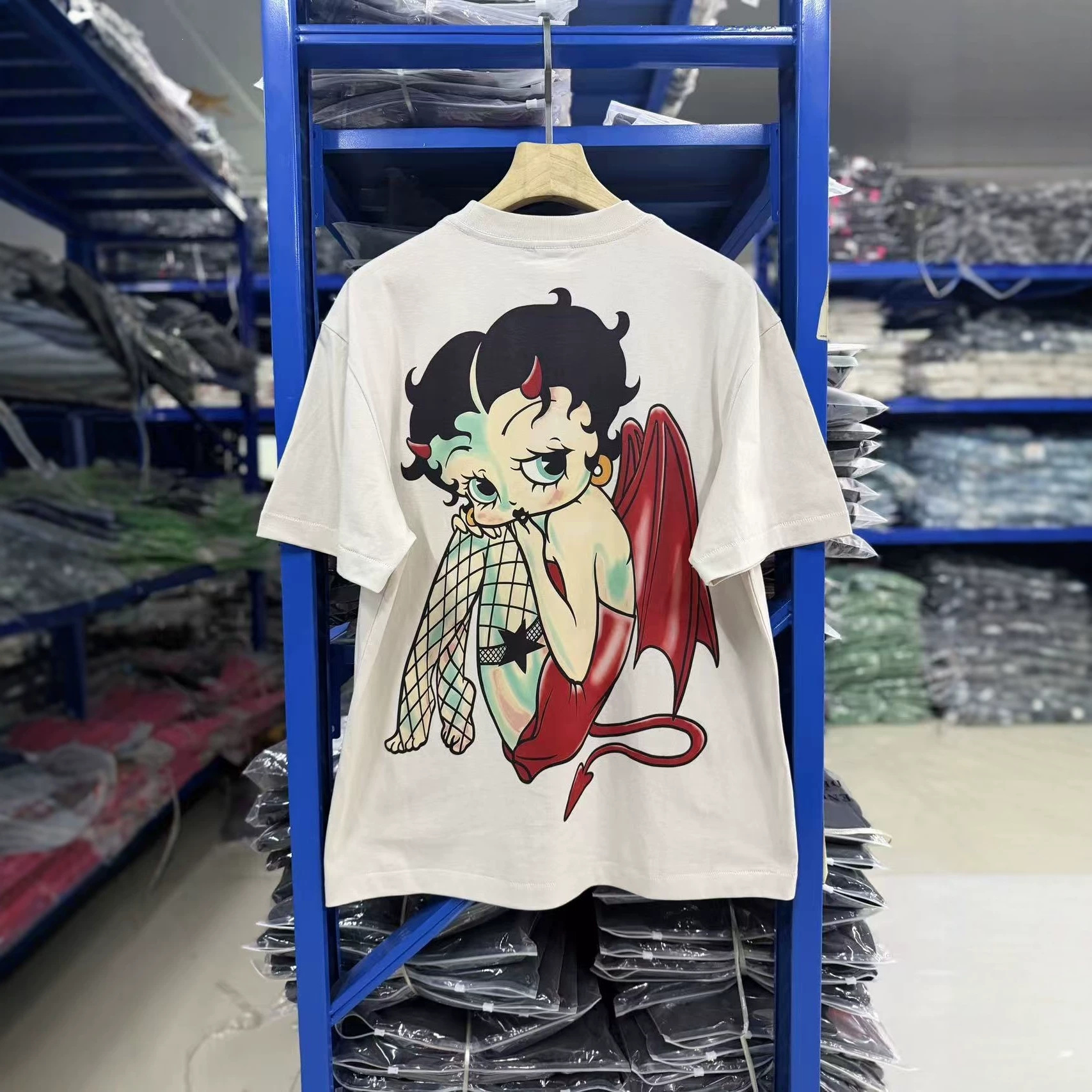 SAINT Mx6 เสื้อยืดแขนสั้นผ้าฝ้ายแท้ พิมพ์ลายการ์ตูนปีศาจเบ็ตตี้ สไตล์อเมริกันวินเทจ ทรงหลวม โอเวอร์ไซส์